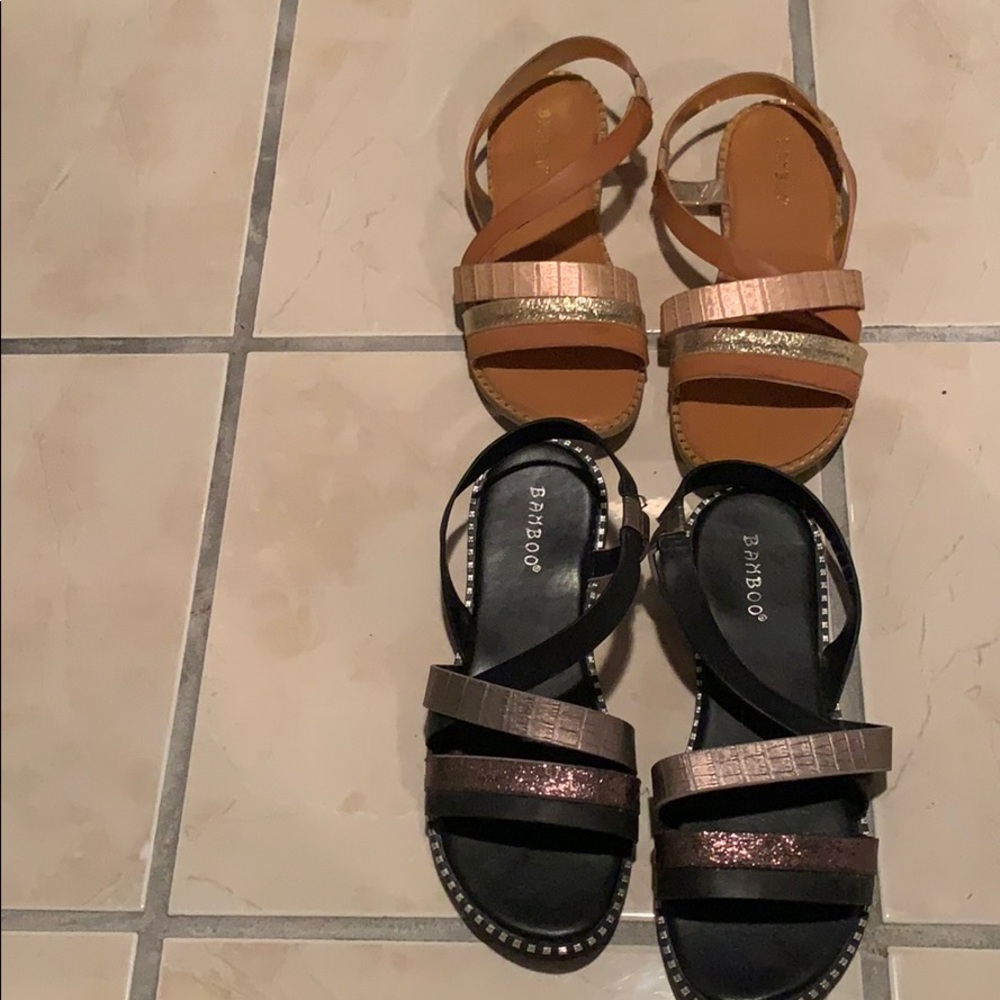 Tan and black sandals.